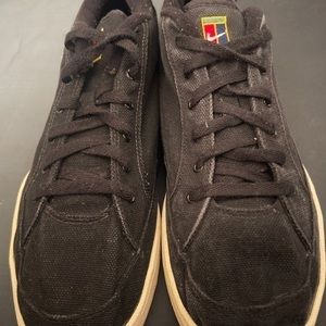 Nike black canvas court shoes. Size 15.
